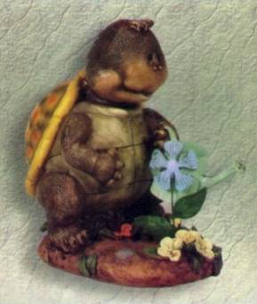 Schildkröte mit Gießkanne